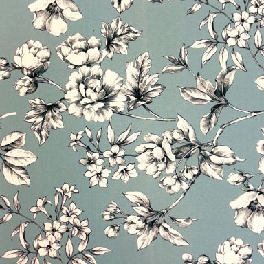Bloom Fondo azul con flores blancas y negras en un diseño elegante y detallado.